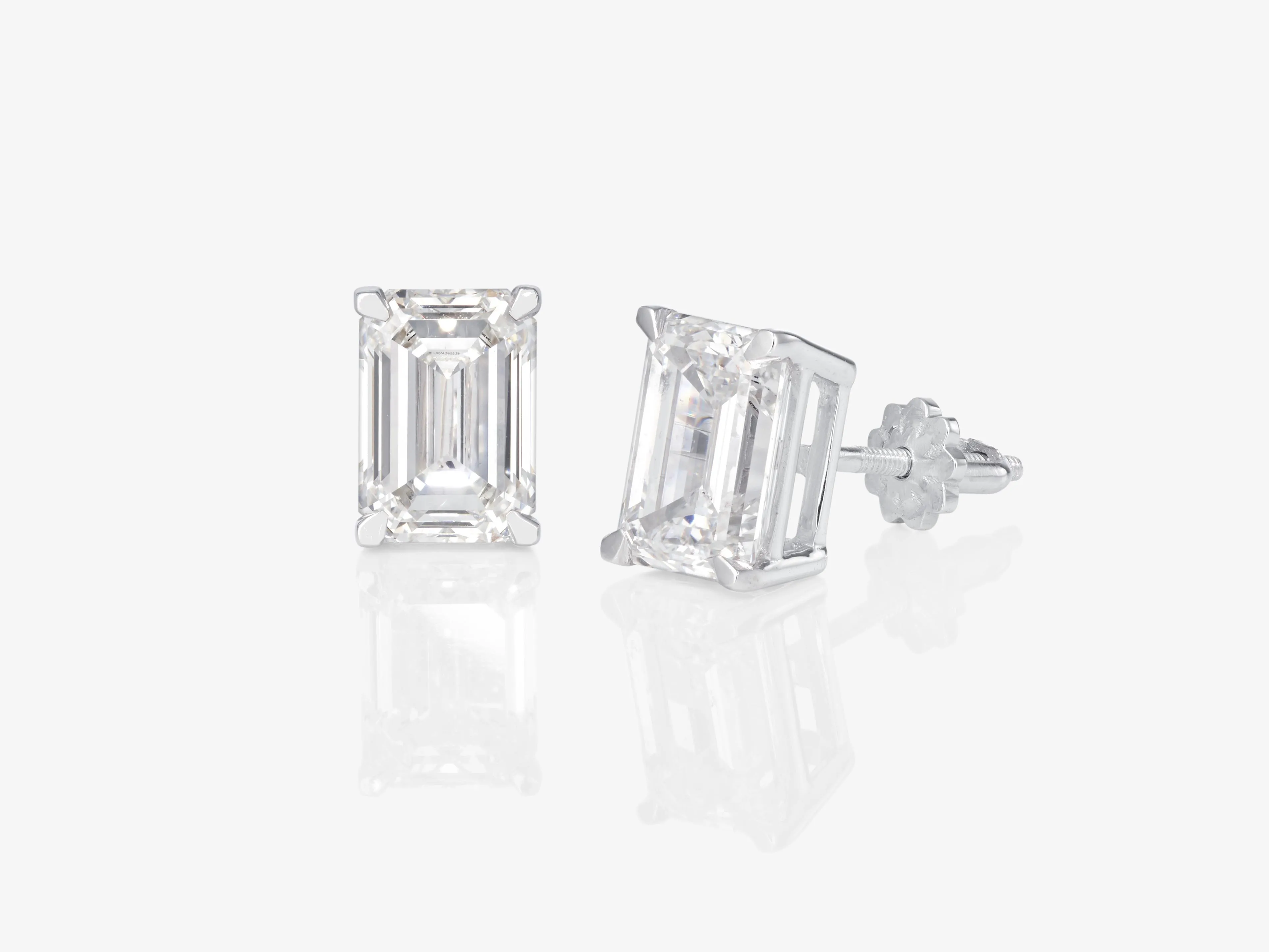 A pair of stud earrings decorated with LAB GROWN diamonds in a puristic ...